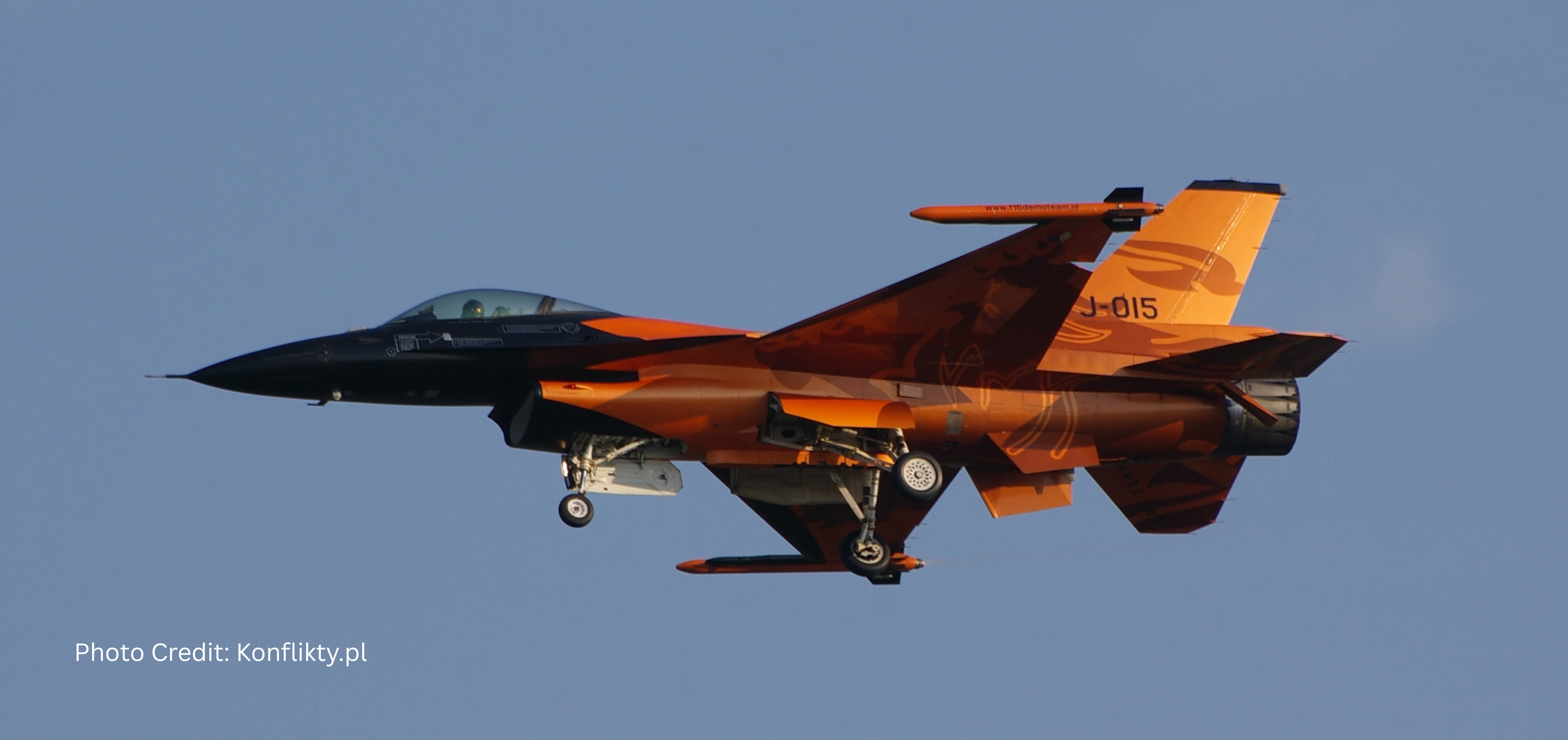 Image of an F-16 flying in the air at an airshow: photo credit: konflikty.pl